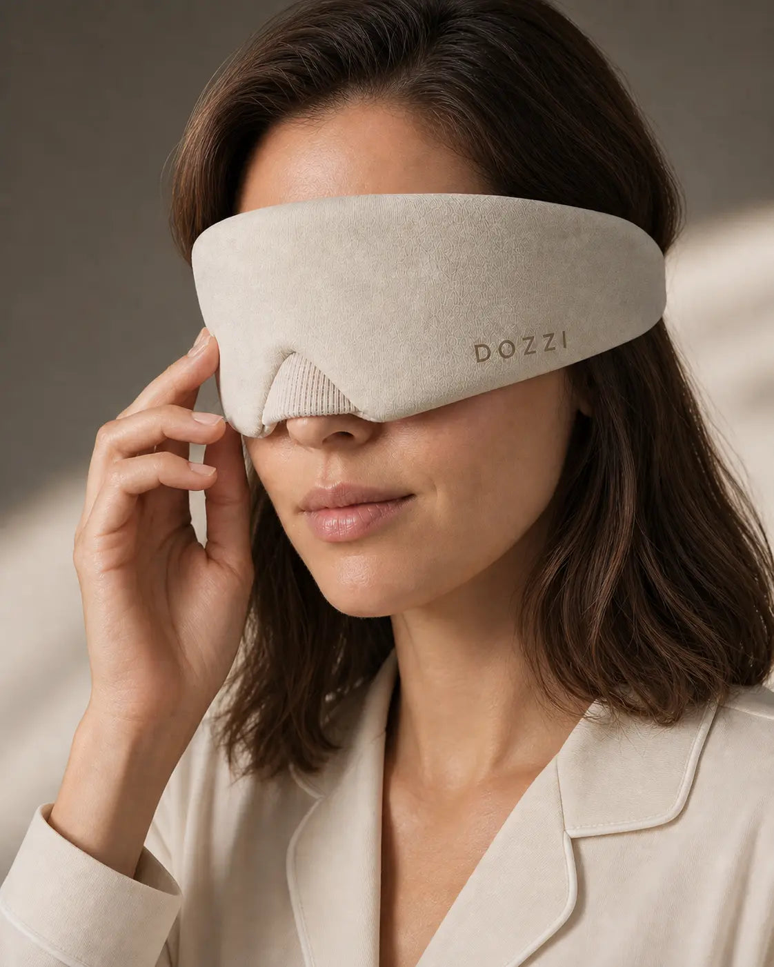 Woman touching the edge of her Apricot DOZZI mask